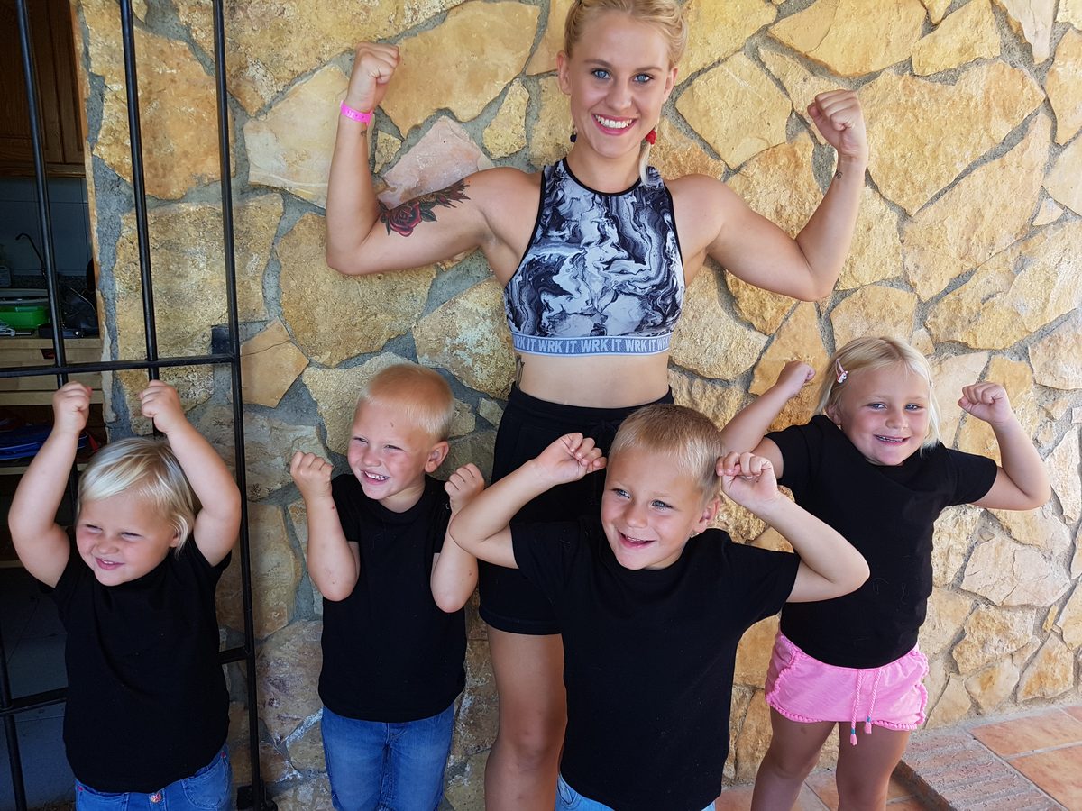 Nia with her children and siblings before a kickboxing competition